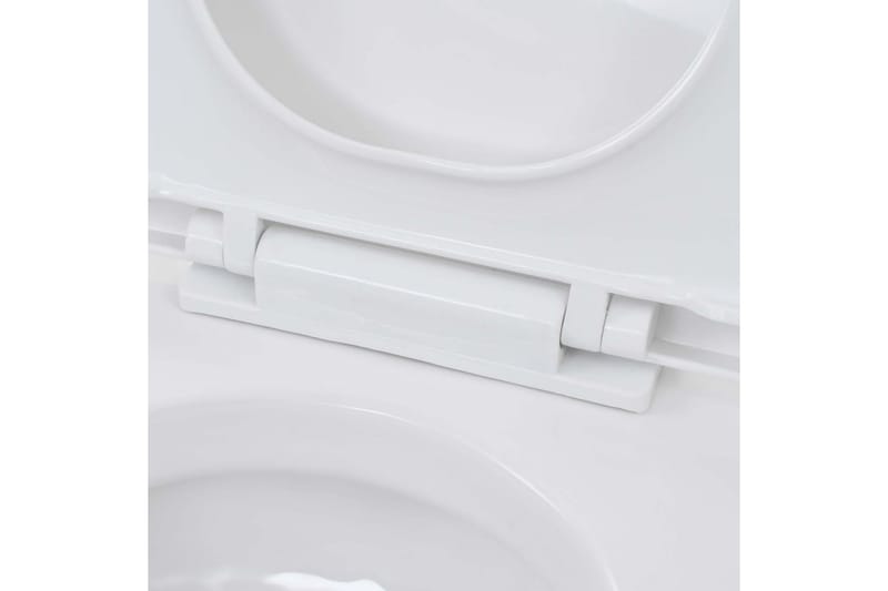 Vegghengt toalett med skjult sisterne keramikk - Hvit - Vegghengt