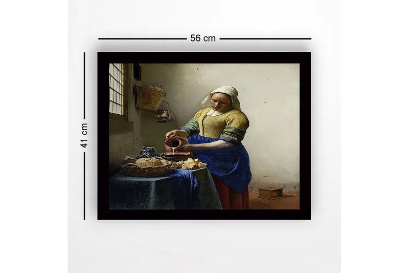 Innrammet lerretsbilde i tre - 41x56 cm - Kvinne som heller melk i en bolle ved et bord med brød og keramikk - Blå / Gul / Brun - Innredning - Bilder & kunst