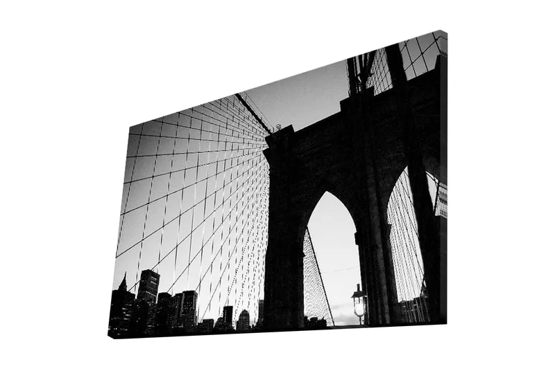 Lerret 70x45 cm - Silhuett av Brooklyn Bridge mot en dramatisk himmel - Svart / Grå - Innredning - Bilder & kunst - Lerretsbilder