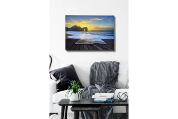 Lerretsbilde - Åpen bok med en strand og solnedgang i bakgrunnen - Blå / Gyllen / Beige - Innredning - Bilder & kunst - Lerretsbilder