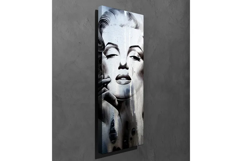 Lerretsbilde 30x80 cm - Portrett av en kvinne med et mystisk og drømmende uttrykk - Svart / Hvit / Grå - Innredning - Bilder & kunst - Lerretsbilder