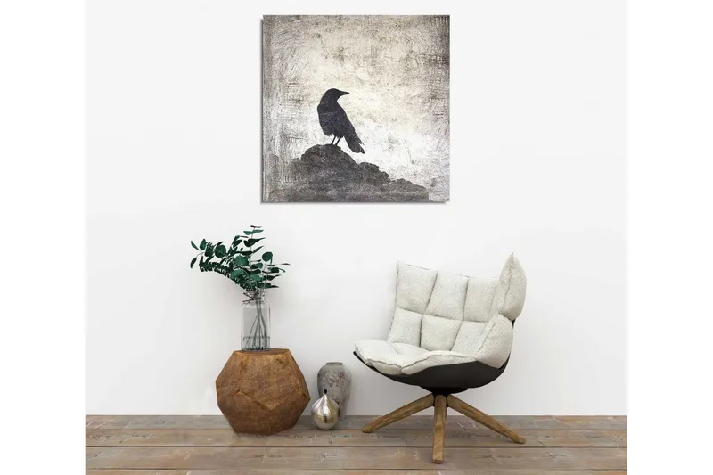 Lerretsbilde 45x45 cm - Silhuett av en kråke på en stein mot en dempet bakgrunn - Svart / Grå / Hvit - Innredning - Bilder & kunst - Lerretsbilder