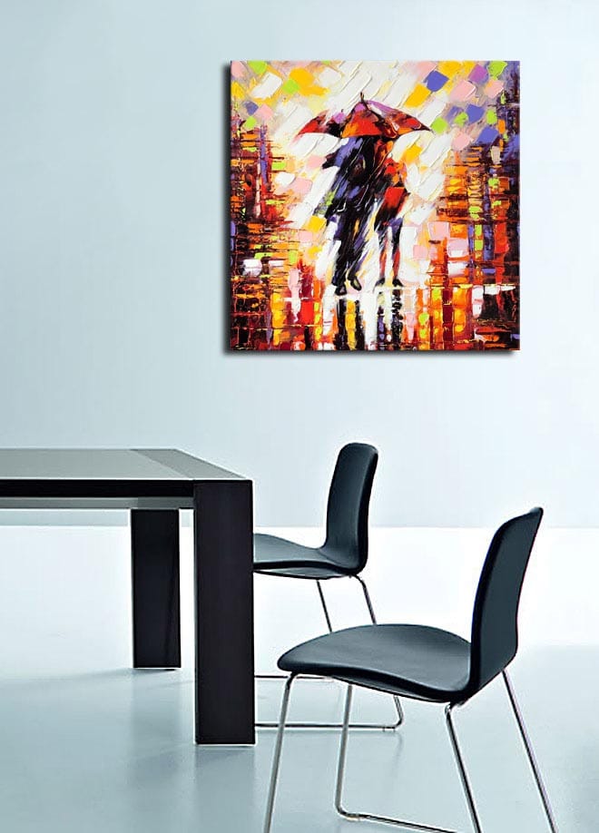 Lerretsbilde 45x45 cm - Silhuett av en person med paraply i et fargerikt bymiljø - Rød / Oransje / Svart - Innredning - Bilder & kunst - Lerretsbilder