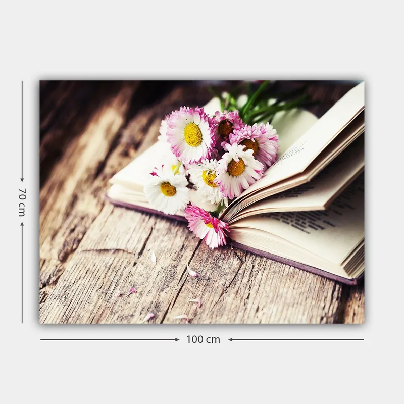 Lerretsbilde 70x100 cm - Blomsterbukett plassert på en åpen bok - Hvit / Rosa / Gul - Innredning - Bilder & kunst - Lerretsbilder