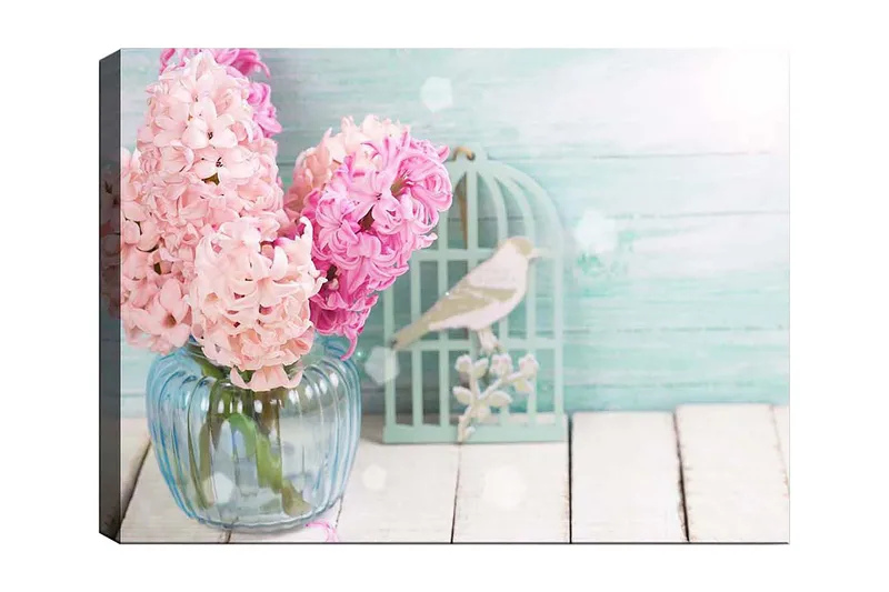 Lerretsbilde 70x100 cm - Bukett med rosa hyasinter i en glassvase, Rosa / Lys blå / Grønn