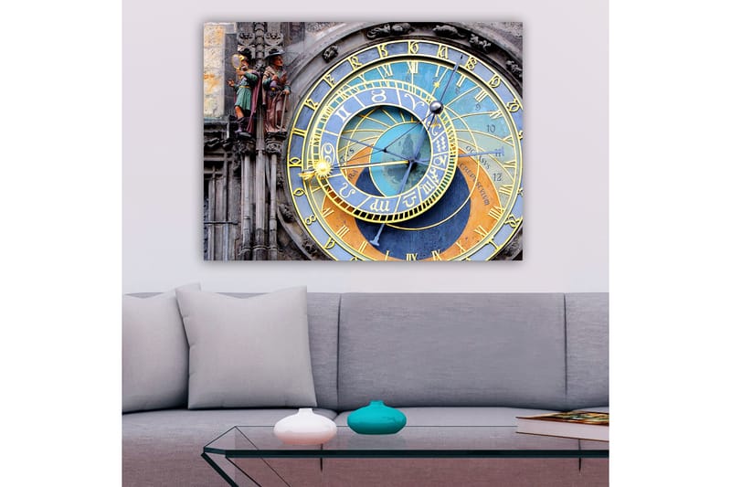 Lerretsbilde 70x100 cm - Detaljert og fargerik astronomisk klokke med gylne og blå detaljer, Gull / Blå / Oransje
