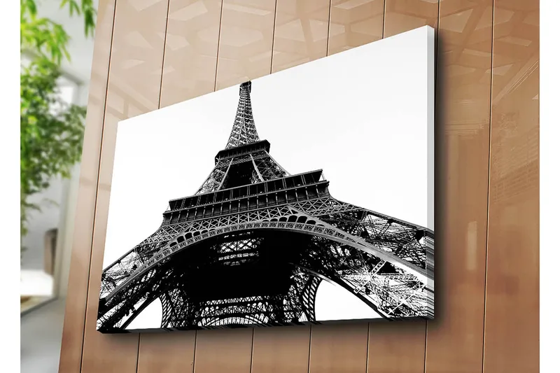 Lerretsbilde 70x100 cm - Dramatisk utsikt over Eiffeltårnet sett fra bunnen av - Svart / Hvit - Innredning - Bilder & kunst - Lerretsbilder