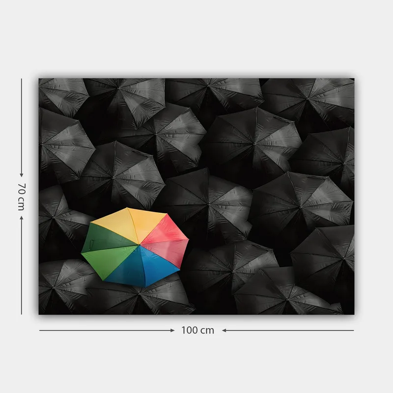 Lerretsbilde 70x100 cm - Ensom fargerik paraply blant en mengde svarte paraplyer - Svart / Gul / Rød - Innredning - Bilder & kunst - Lerretsbilder