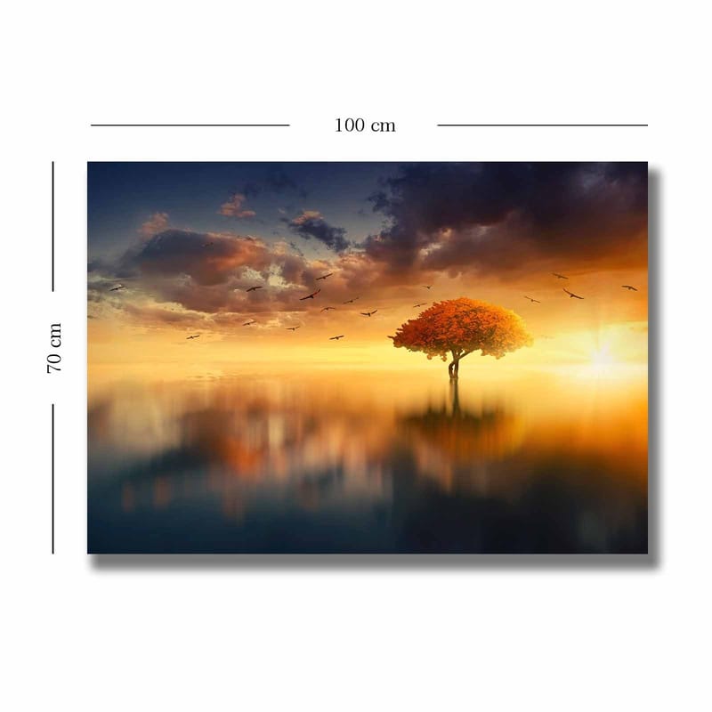 Lerretsbilde 70x100 cm - Et ensomt tre med en strålende oransje krone i et drømmeaktig landskap med solnedgang - Oransje / Blå / Gull - Innredning - Bilder & kunst - Lerretsbilder