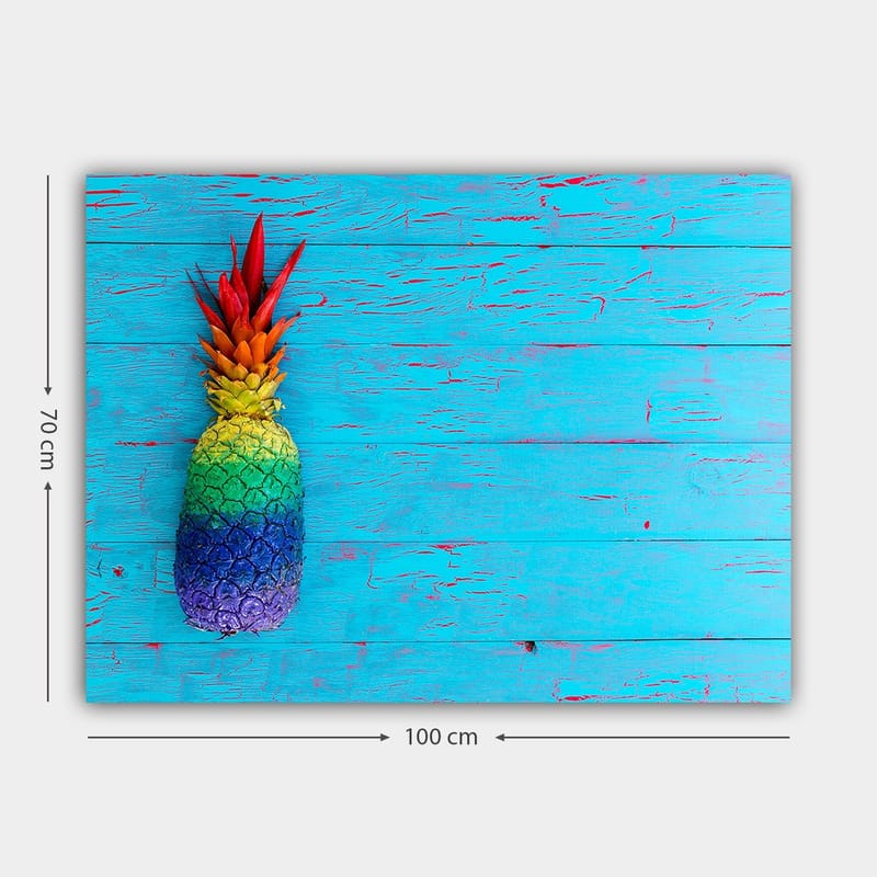 Lerretsbilde 70x100 cm - Fargerik ananas mot en lyseblå bakgrunn - Blå / Grønn / Rød - Innredning - Bilder & kunst - Lerretsbilder