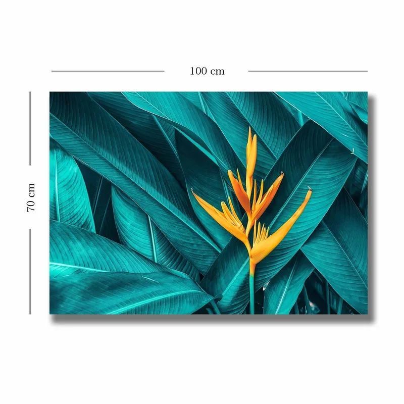 Lerretsbilde 70x100 cm - Fargerik blomst omgitt av store, grønne blader - Turkis / Gul - Innredning - Bilder & kunst - Lerretsbilder