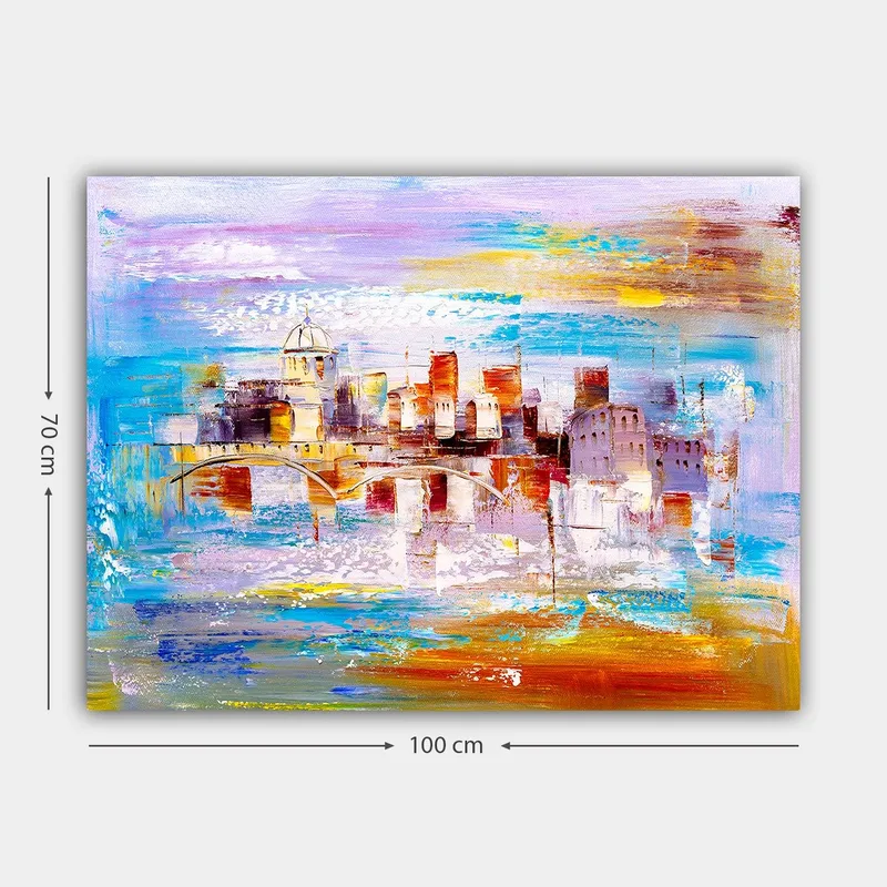 Lerretsbilde 70x100 cm - Fargerik bybilde med en bro som strekker seg over et vann - Blå / Oransje / Lilla - Innredning - Bilder & kunst - Lerretsbilder