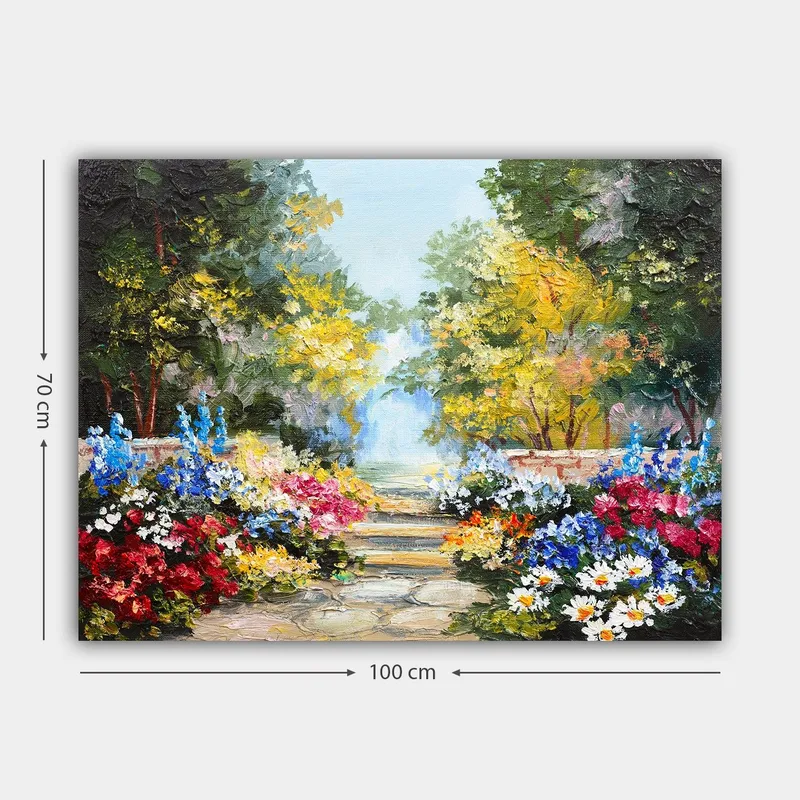 Lerretsbilde 70x100 cm - Fargerik hage med blomsteroppsatser og en asfaltert sti som fører inn i et frodig miljø - Grønn / Rød / Blå - Innredning - Bilder & kunst - Lerretsbilder