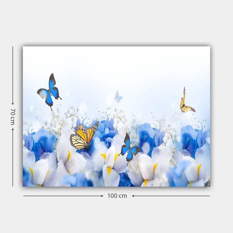 Lerretsbilde 70x100 cm - Fargerik komposisjon av sommerfugler som svever over hvite og blå blomster - Blå / Hvit / Gul - Innredning - Bilder & kunst - Lerretsbilder