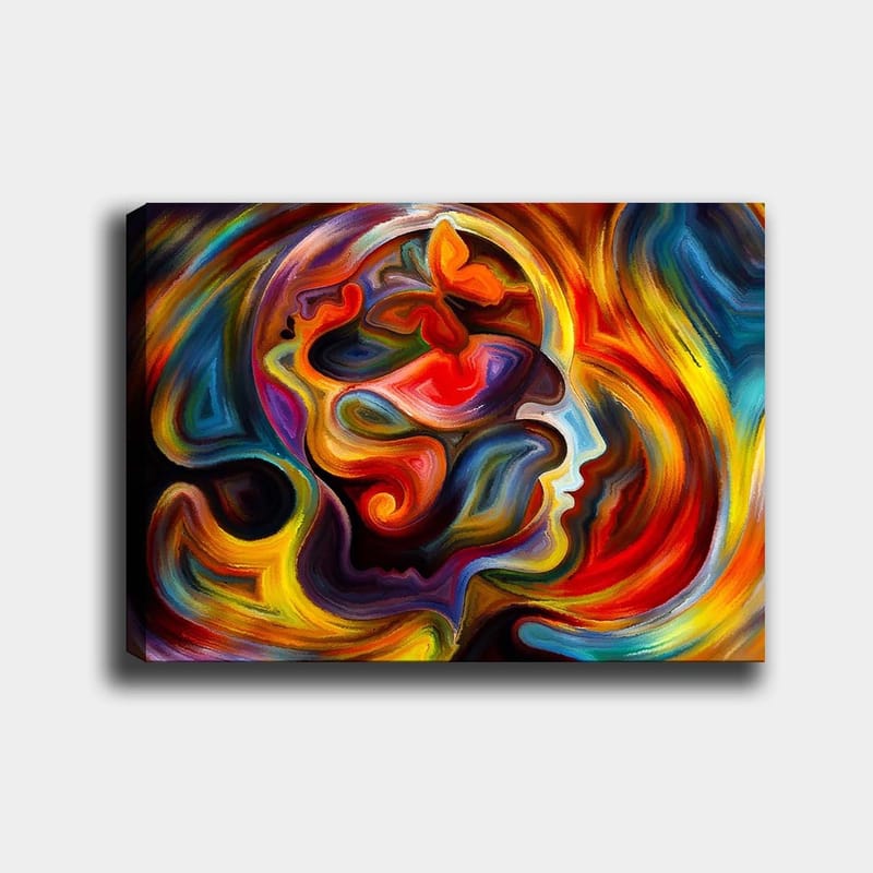 Lerretsbilde 70x100 cm - Fargerik og abstrakt skildring av en persons profil med elementer av en sommerfugl som symboliserer transformasjon og frihet, Rød / Oransje / Blå