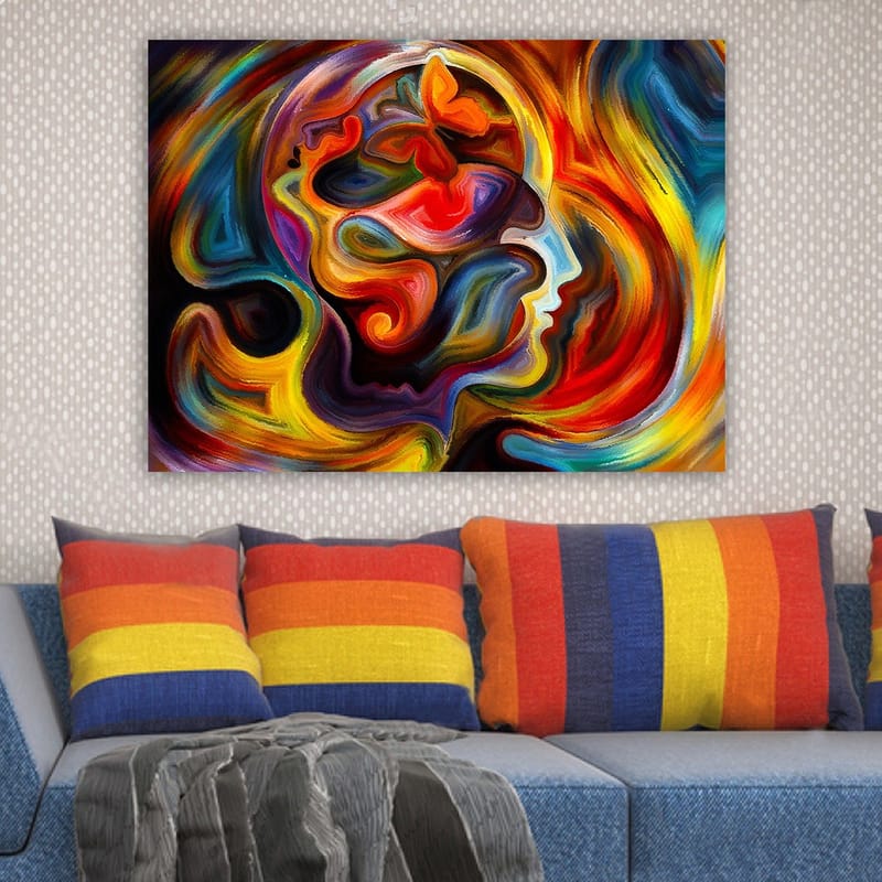 Lerretsbilde 70x100 cm - Fargerik og abstrakt skildring av en persons profil med elementer av en sommerfugl som symboliserer transformasjon og frihet - Rød / Oransje / Blå - Innredning - Bilder & kunst - Lerretsbilder