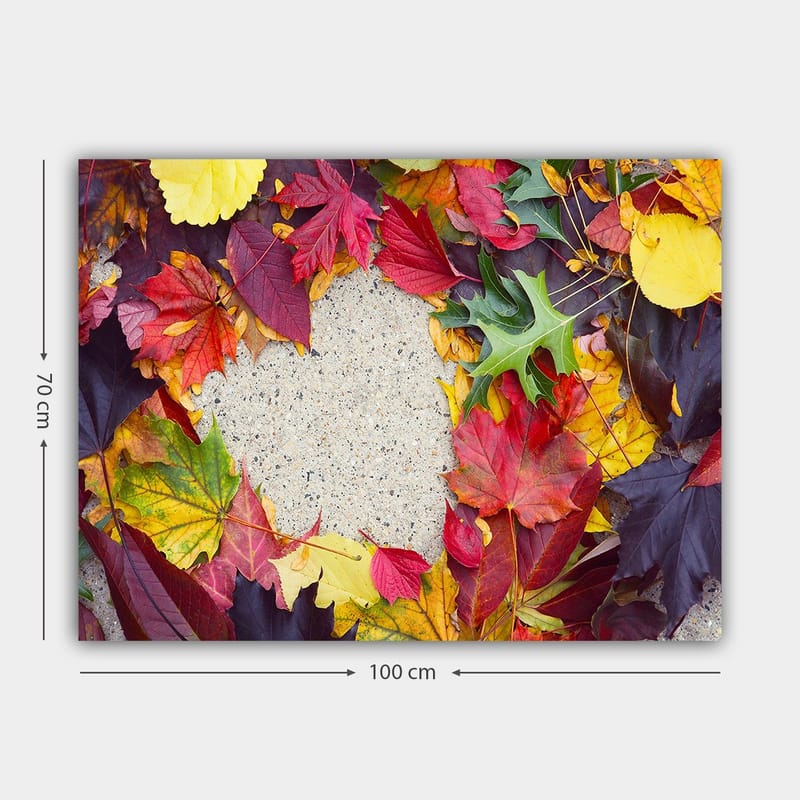 Lerretsbilde 70x100 cm - Fargerik samling av høstblader i forskjellige nyanser rundt en grå overflate - Rød / Gul / Grønn - Innredning - Bilder & kunst - Lerretsbilder