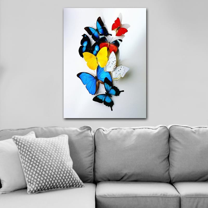 Lerretsbilde 70x100 cm - Fargerik samling av sommerfugler i forskjellige nyanser som skaper en levende og dynamisk komposisjon - Blå / Gul / Rød - Innredning - Bilder & kunst - Lerretsbilder