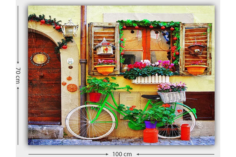Lerretsbilde 70x100 cm - Fargerik sykkel pyntet med blomster og potter foran en sjarmerende vegg med vinduer og dekorasjoner - Grønn / Rosa / Oransje - Innredning - Bilder & kunst - Lerretsbilder