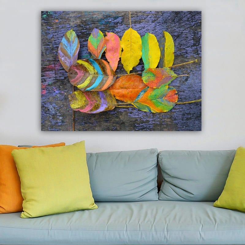 Lerretsbilde 70x100 cm - Fargerike blader arrangert på en mørk bakgrunn - Gul / Oransje / Grønn - Innredning - Bilder & kunst - Lerretsbilder