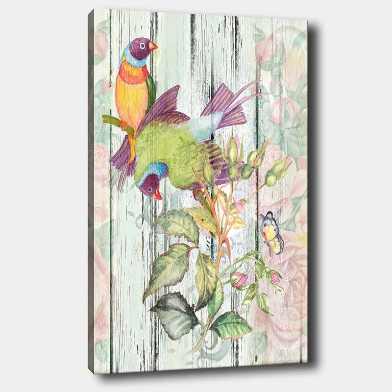 Lerretsbilde 70x100 cm - Fargerike fugler som sitter på en blomstrende gren, Grønn / Blå / Oransje