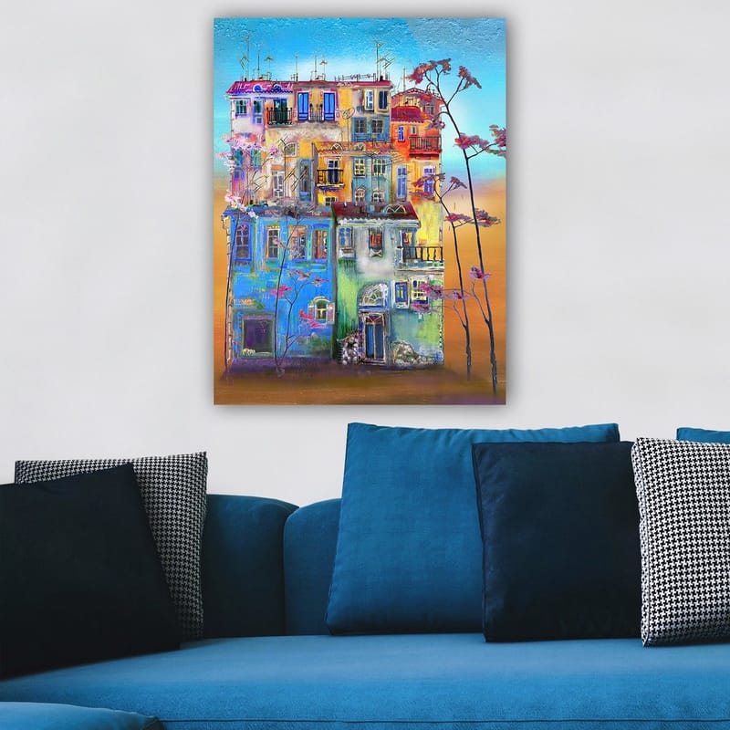 Lerretsbilde 70x100 cm - Fargerike hus i et urbant miljø med blomstrende trær i forgrunnen - Blå / Grønn / Oransje - Innredning - Bilder & kunst - Lerretsbilder