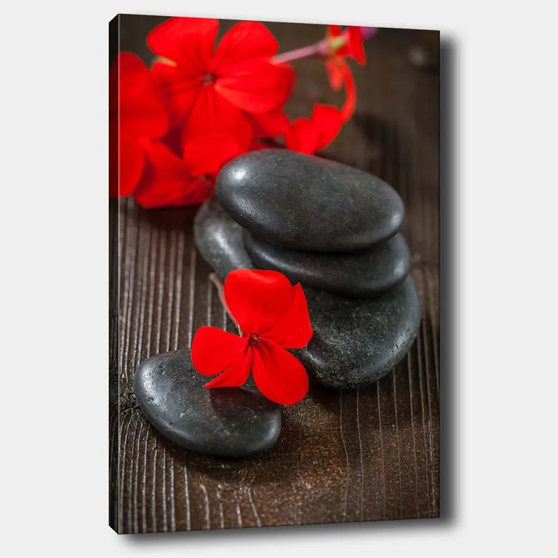 Lerretsbilde 70x100 cm - Harmonisk komposisjon av svarte steiner og røde blomster som skaper en kontrastfylt og rolig atmosfære, Rød / Svart