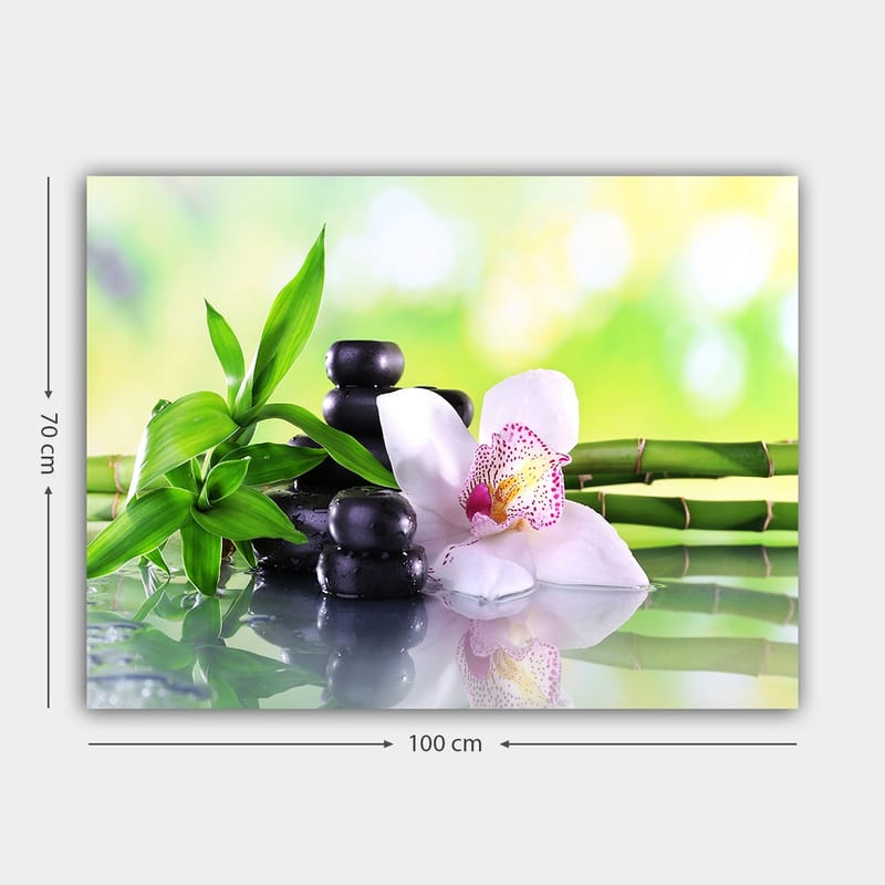 Lerretsbilde 70x100 cm - Harmonisk komposisjon med svarte steiner, en hvit orkide og grønne bambusskudd - Svart / Grønn / Hvit - Innredning - Bilder & kunst - Lerretsbilder