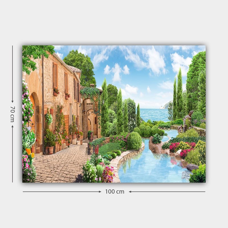 Lerretsbilde 70x100 cm - Idyllisk landsby med blomster, trær og en glitrende innsjø i bakgrunnen - Grønn / Blå / Terrakotta - Innredning - Bilder & kunst - Lerretsbilder