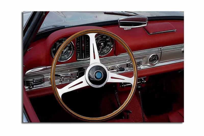Lerretsbilde 70x100 cm - Klassisk bilinteriør med fokus på rattet og dashbordet - Rød / Sølv / Svart - Innredning - Bilder & kunst - Lerretsbilder