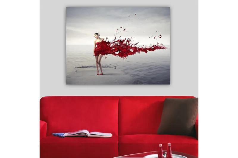 Lerretsbilde 70x100 cm - Kvinne i rød kjole som ser ut til å slippe løs en malingssprutende bevegelse - Rød / Beige - Innredning - Bilder & kunst - Lerretsbilder