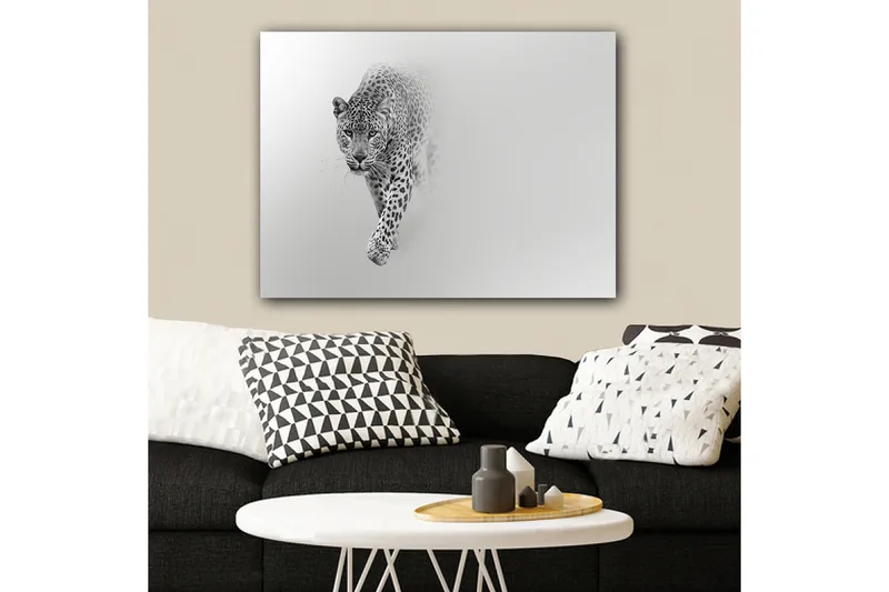 Lerretsbilde 70x100 cm - Majestetisk leopard som beveger seg fremover i en stilig og minimalistisk komposisjon - Svart / Grå - Innredning - Bilder & kunst - Lerretsbilder