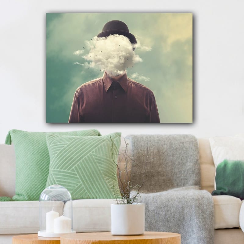 Lerretsbilde 70x100 cm - Mann med hatt hvis ansikt er skjult av en skyformasjon - Mørk brun / Lys grå / Grønn - Innredning - Bilder & kunst - Lerretsbilder