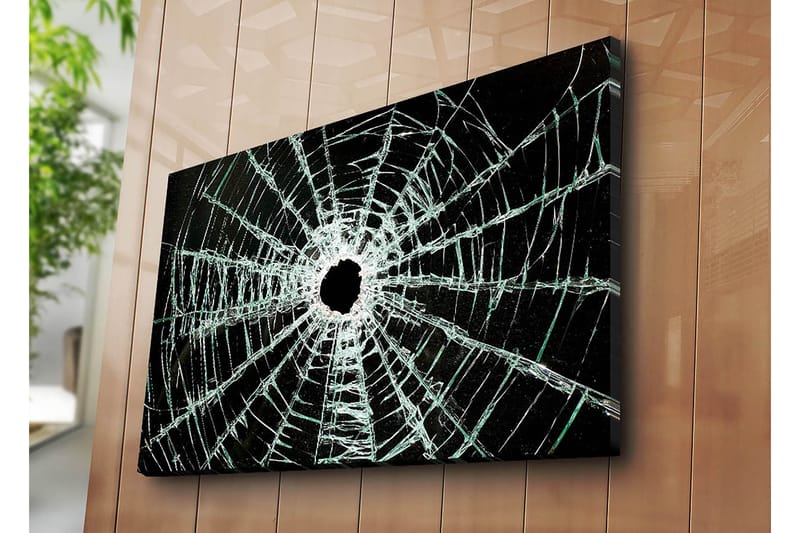 Lerretsbilde 70x100 cm - Nærbilde av en sprukket glassrute med et hull i midten og sprekker som strekker seg utover - Svart / Gjennomsiktig - Innredning - Bilder & kunst - Lerretsbilder