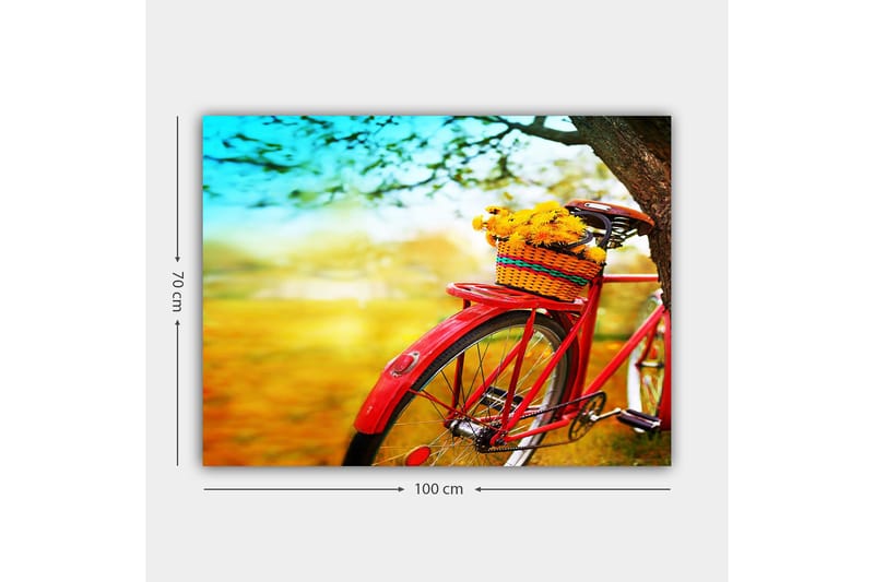 Lerretsbilde 70x100 cm - Rød sykkel med en kurv fylt med gule blomster - Rød / Gul / Grønn - Innredning - Bilder & kunst - Lerretsbilder