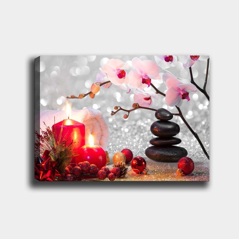 Lerretsbilde 70x100 cm - Rolig komposisjon med lyse orkideer, svarte steiner og røde lys som skaper en harmonisk atmosfære, Rosa / Rød / Svart
