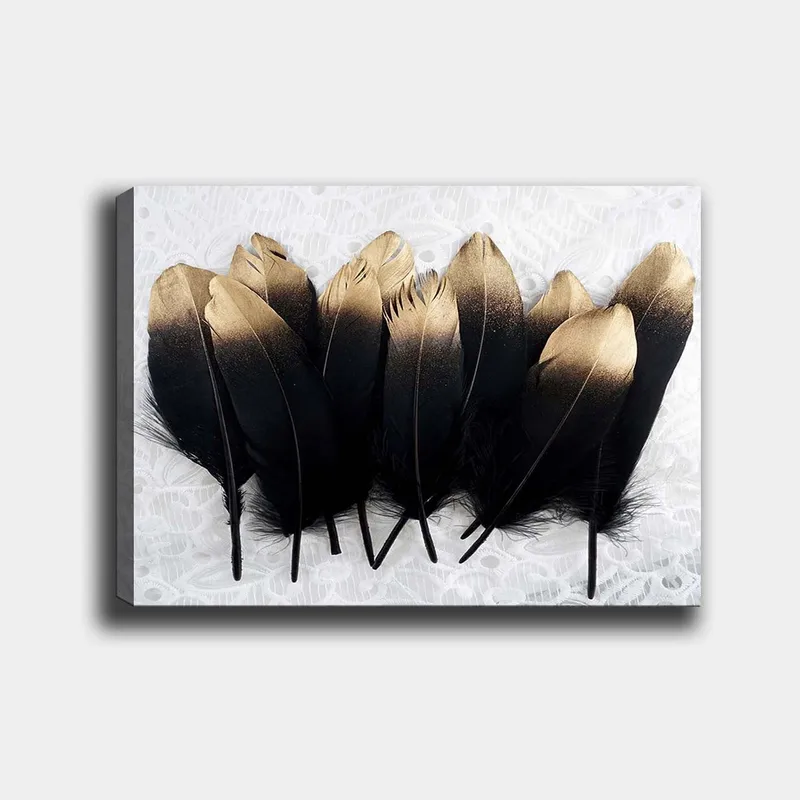 Lerretsbilde 70x100 cm - Samling av elegante fjær i svart og gull, Svart / Gull