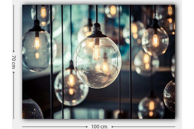 Lerretsbilde 70x100 cm - Samling av hengende lyspærer i forskjellige størrelser som skaper en atmosfære av varme og lys - Klar / Svart / Gull - Innredning - Bilder & kunst - Lerretsbilder