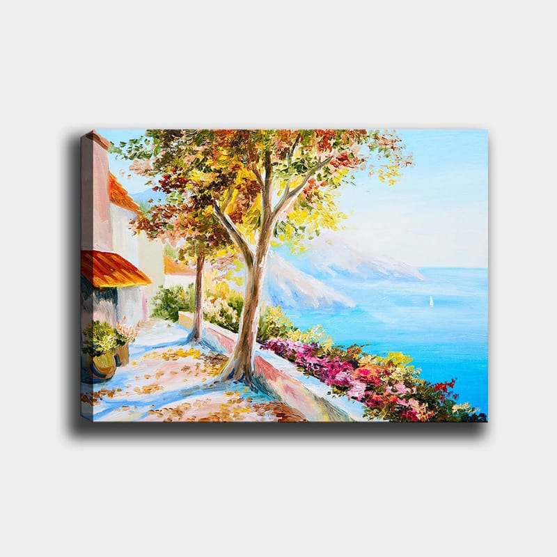 Lerretsbilde 70x100 cm - Solrik kyststi med fargerike trær og blomster som fører ned til havet - Blå / Grønn / Oransje - Innredning - Bilder & kunst - Lerretsbilder