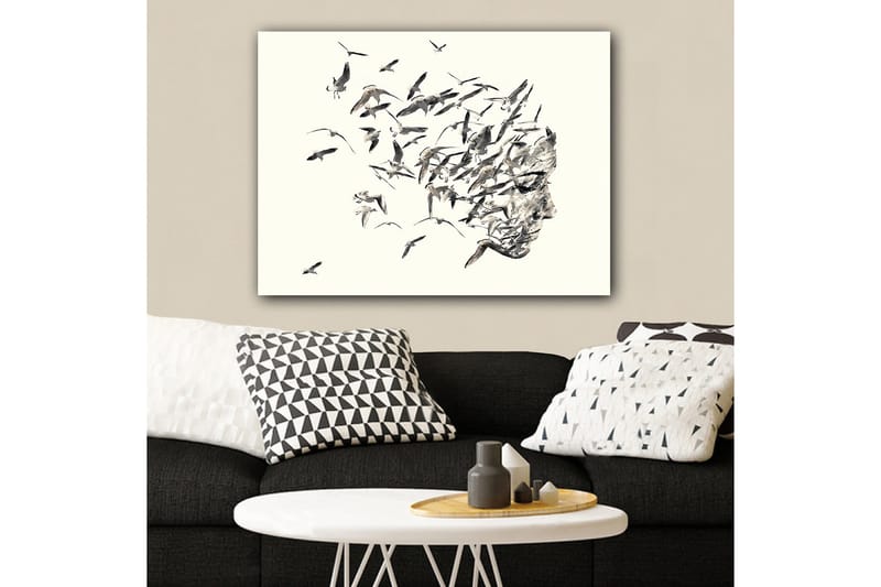 Lerretsbilde 70x100 cm - Stilisert ansiktsprofil som smelter sammen med flygende fugler, Grå / Svart / Beige