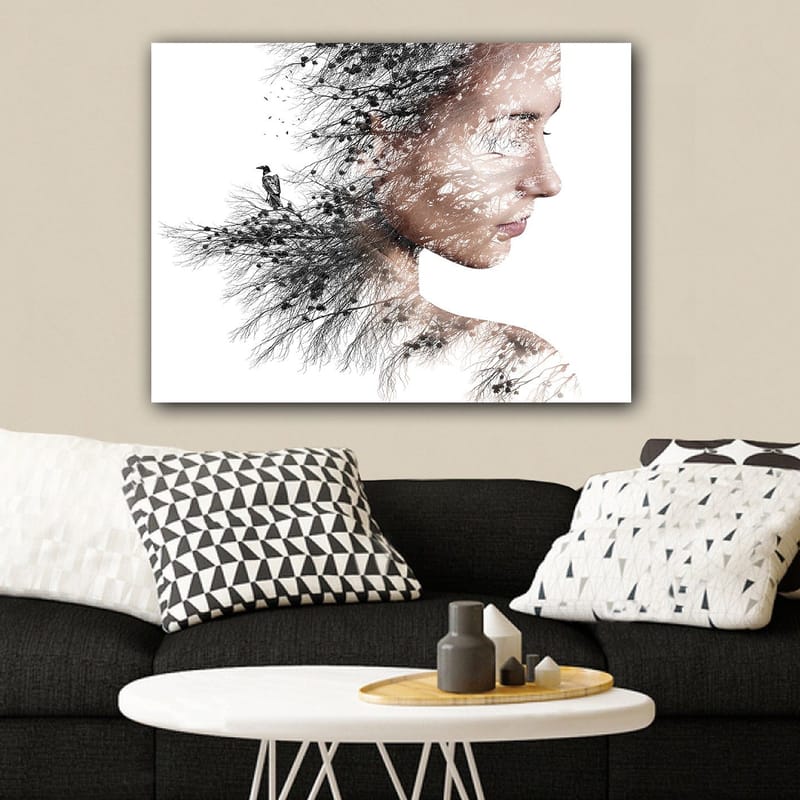 Lerretsbilde 70x100 cm - Stilisert portrett av en kvinne med trær og fugler som en del av silhuetten hennes - Svart / Grå / Brun - Innredning - Bilder & kunst - Lerretsbilder