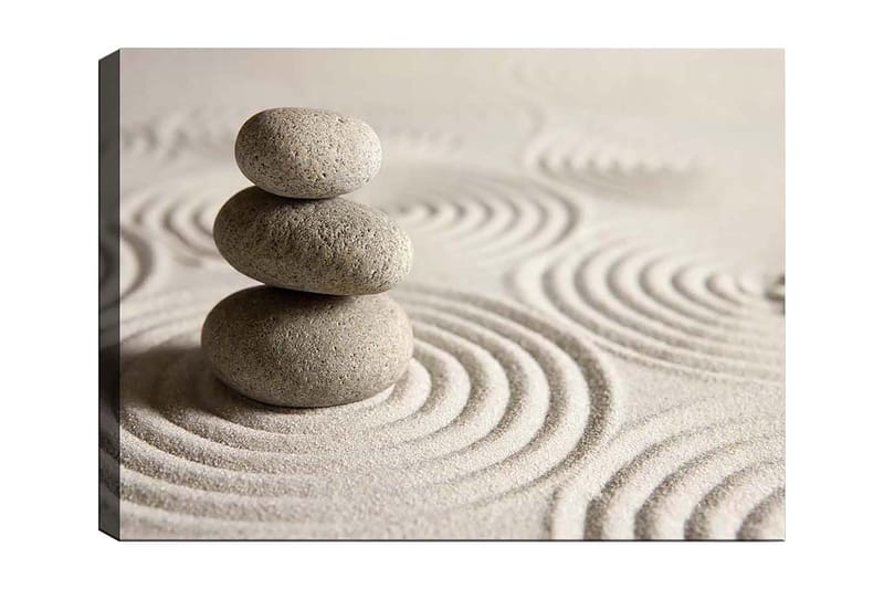 Lerretsbilde 70x100 cm - Tre stablede steiner på en sandoverflate med bølgete mønstre, Grå / Beige