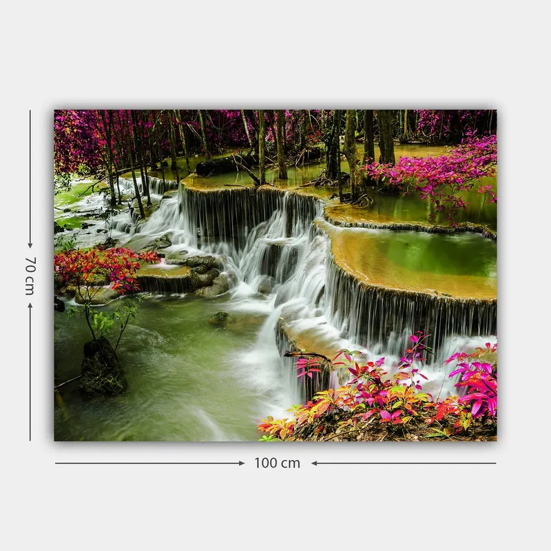 Lerretsbilde 70x100 cm - Vakker foss omgitt av fargerike blomster og frodige trær - Grønn / Rosa / Brun - Innredning - Bilder & kunst - Lerretsbilder
