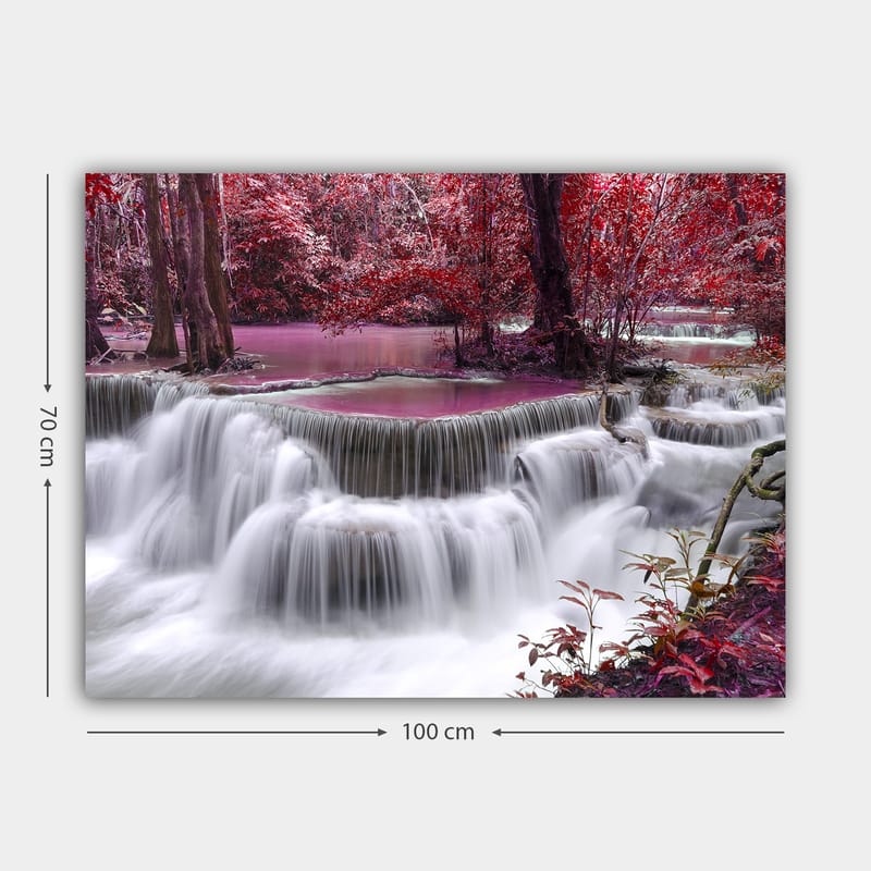 Lerretsbilde 70x100 cm - Vakker foss omgitt av fargerike trær og vegetasjon - Rød / Lilla / Hvit - Innredning - Bilder & kunst - Lerretsbilder