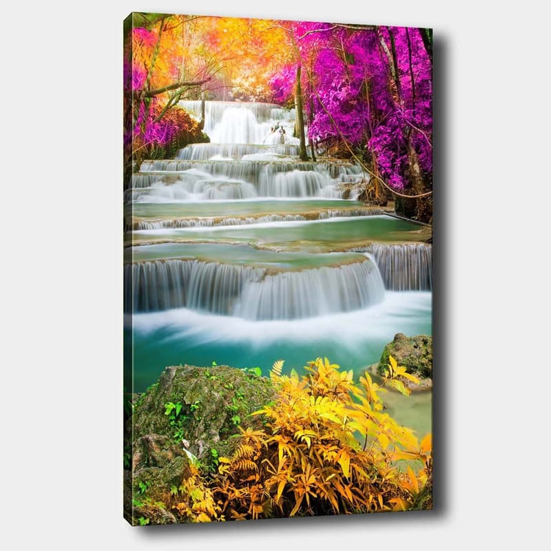 Lerretsbilde 70x100 cm - Vakker foss omgitt av fargerike trær og planter, Lilla / Grønn / Oransje