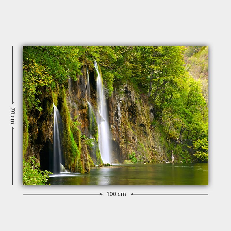 Lerretsbilde 70x100 cm - Vakker foss omgitt av frodig grøntområde - Grønn / Brun / Hvit - Innredning - Bilder & kunst - Lerretsbilder