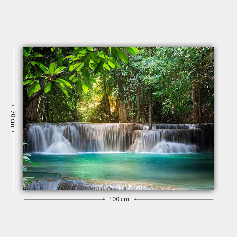 Lerretsbilde 70x100 cm - Vakker foss omgitt av frodig grøntområde - Grønn / Turkis / Brun - Innredning - Bilder & kunst - Lerretsbilder