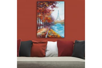 Lerretsbilde 70x100 cm - Vakker høstscene med Eiffeltårnet i bakgrunnen, omgitt av fargerike trær og en glitrende elv - Rød / Blå / Oransje - Innredning - Bilder & kunst - Lerretsbilder