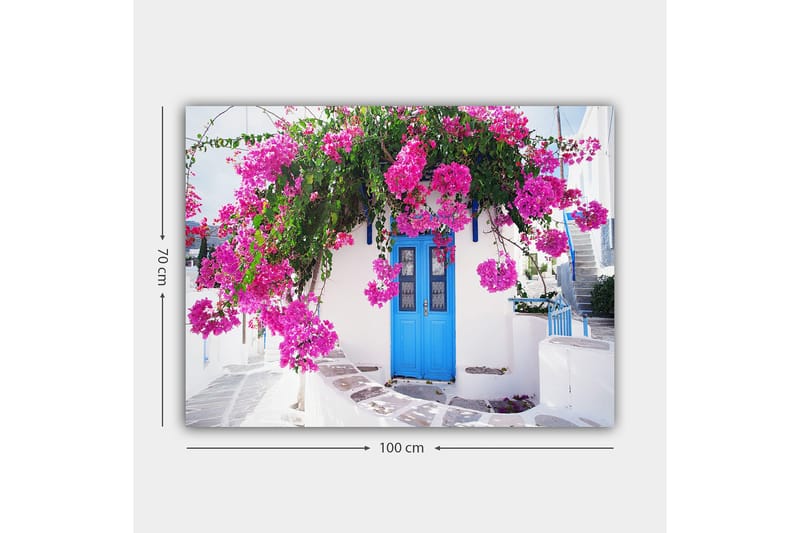 Lerretsbilde 70x100 cm - Vakker hvit bygning med en blå dør omgitt av lilla blomster - Lilla / Blå / Grønn - Innredning - Bilder & kunst - Lerretsbilder