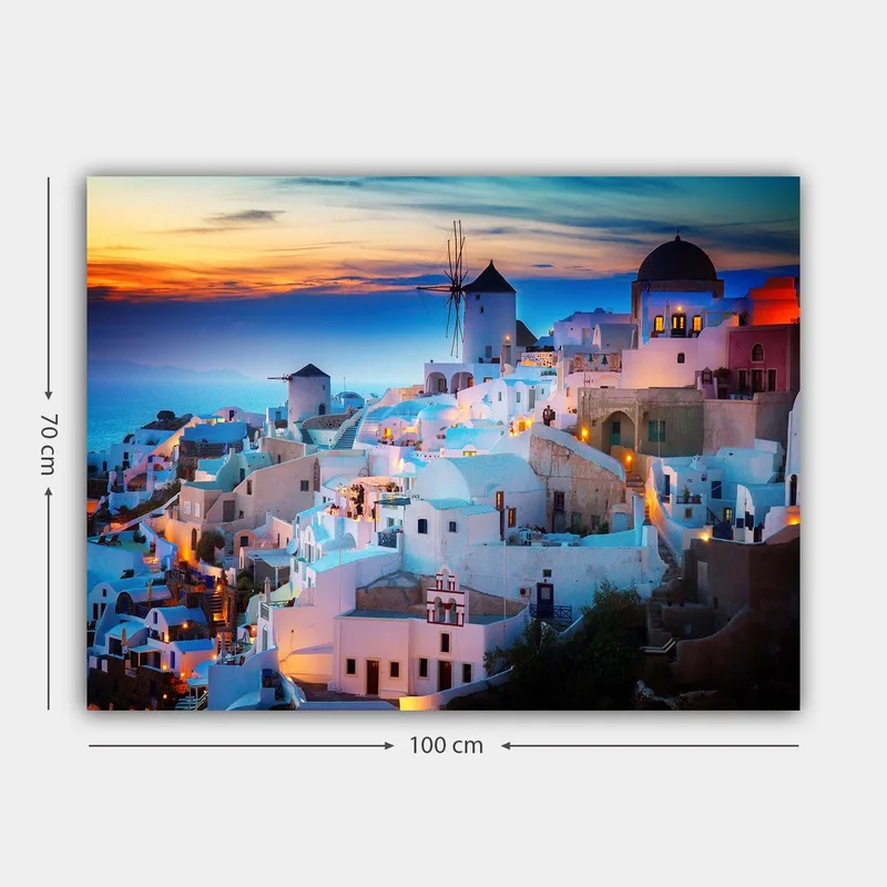 Lerretsbilde 70x100 cm - Vakker utsikt over de hvite husene i en gresk landsby ved solnedgang - Hvit / Blå / Oransje - Innredning - Bilder & kunst - Lerretsbilder